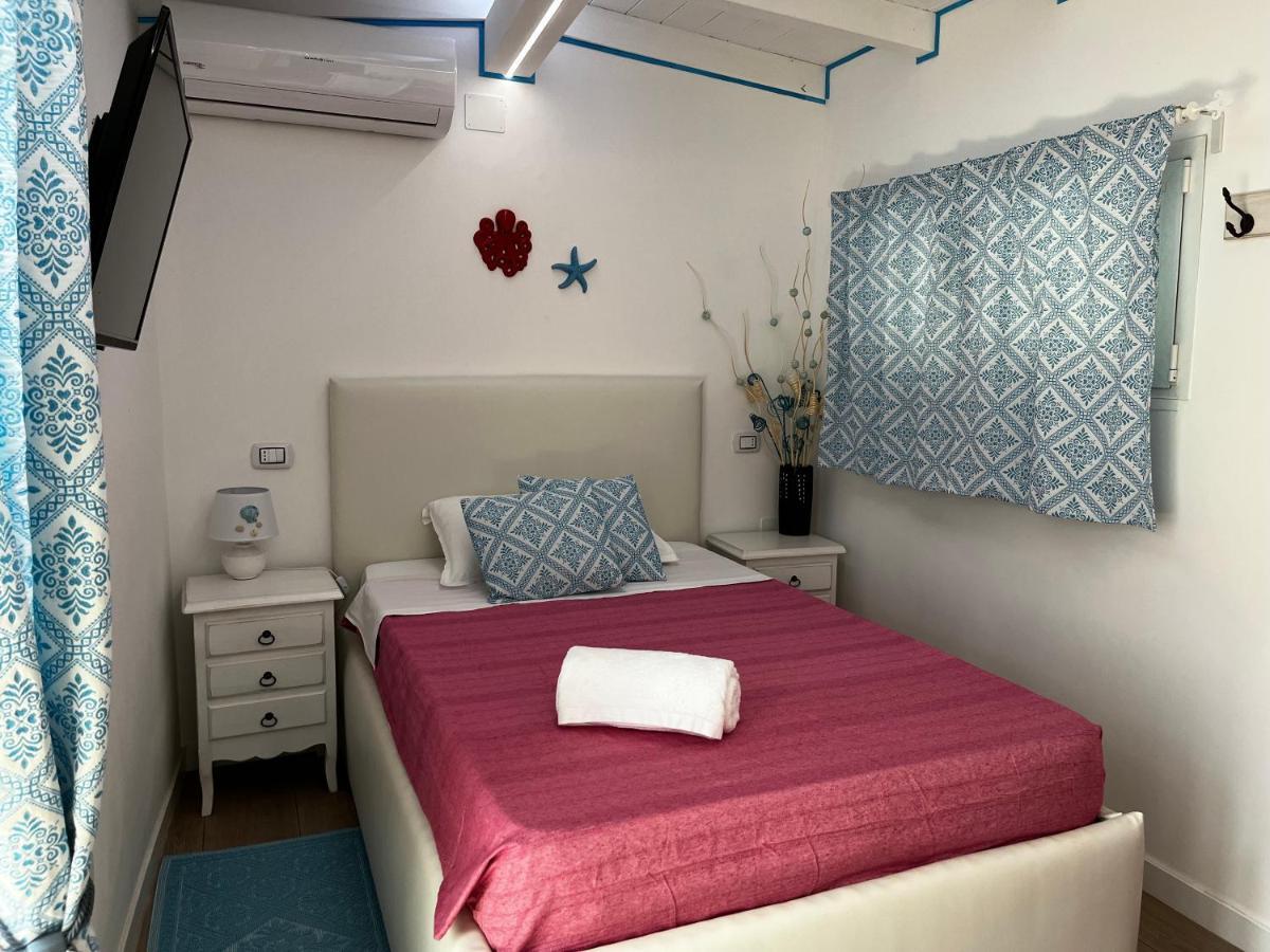 Palmasera Charming Rooms Cala Gonone Bagian luar foto