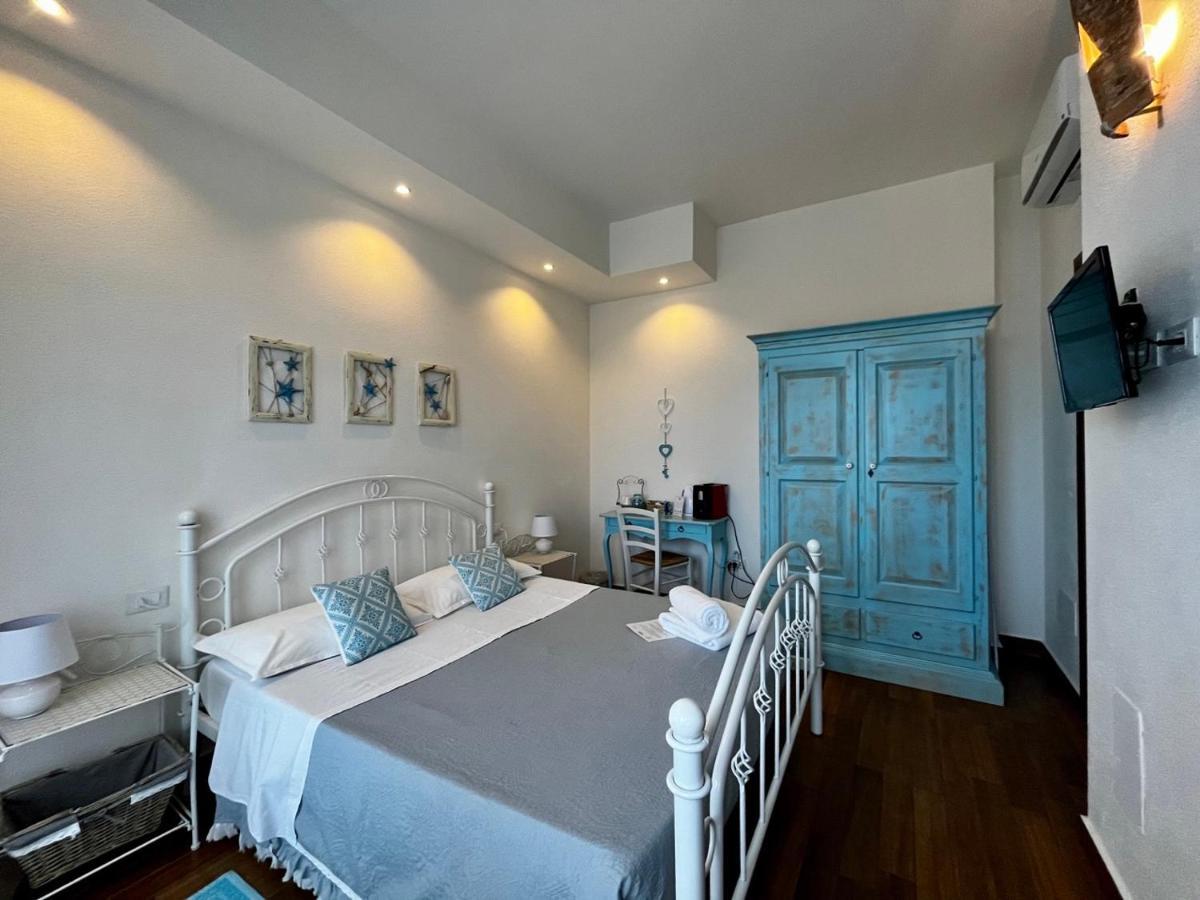 Palmasera Charming Rooms Cala Gonone Bagian luar foto