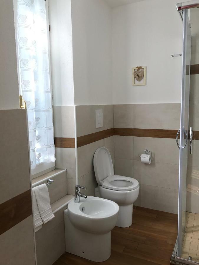 Palmasera Charming Rooms Cala Gonone Bagian luar foto