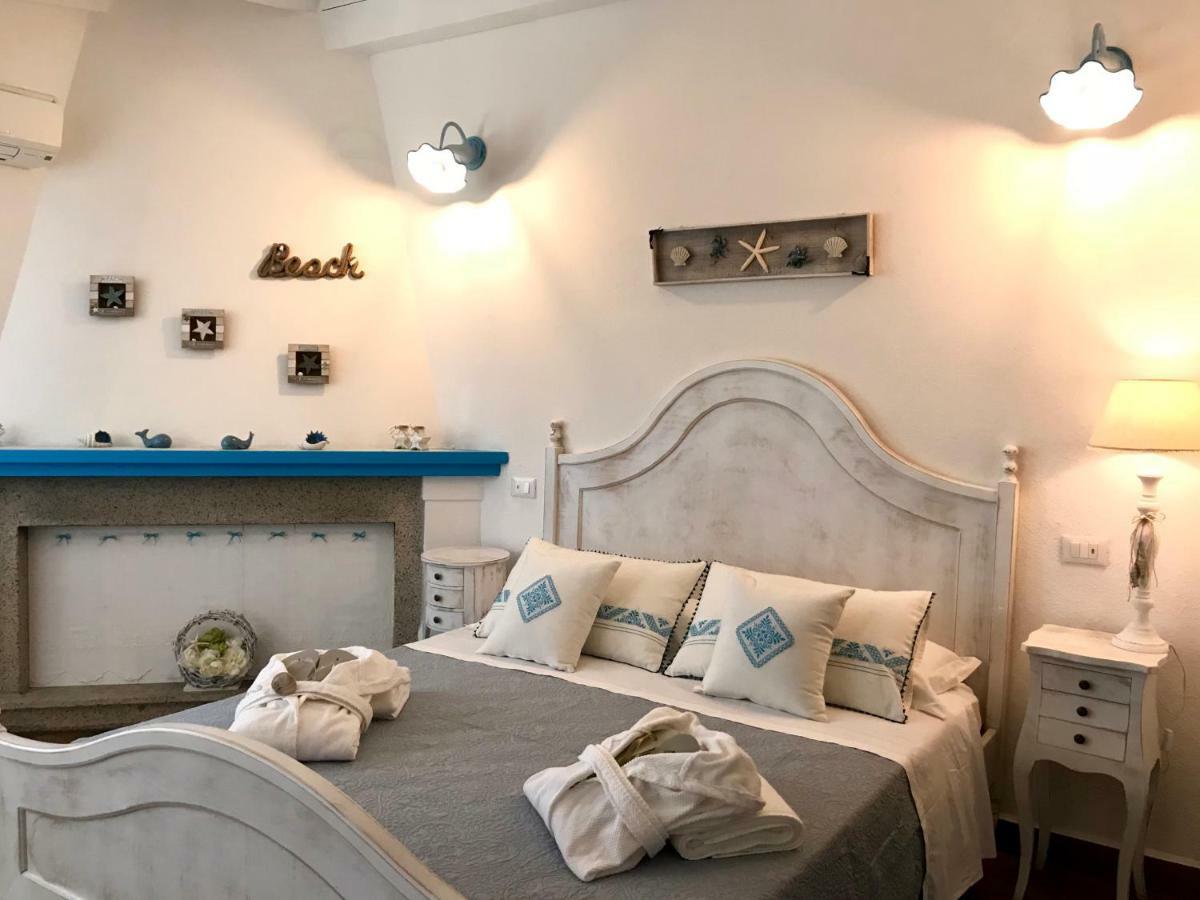 Palmasera Charming Rooms Cala Gonone Bagian luar foto